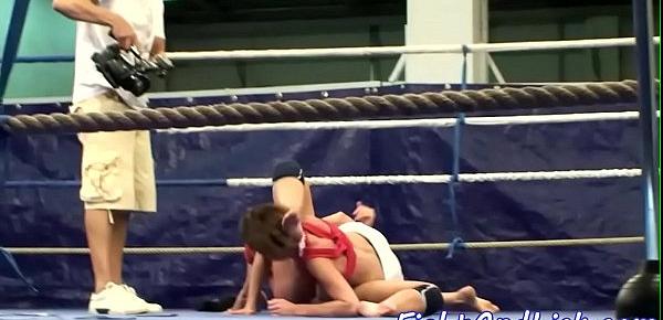  Muscular lesbians wrestling in a boxing ring